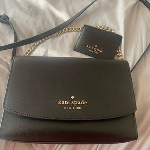 This hand bag and wallet is in perfect condition. no scratches.